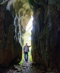 Bill in cave by the road to Playa de Cuevas del Mar