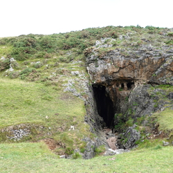 Stream [dry in June] sinking into sea cave